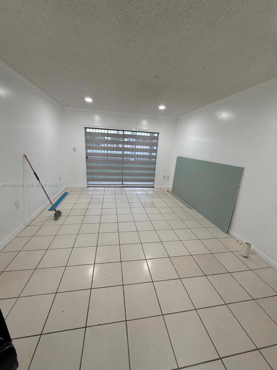 9520 Southwest 8th Street, Unit 111 Miami, FL 33174 - Photo 26 of 31 a view of an empty room