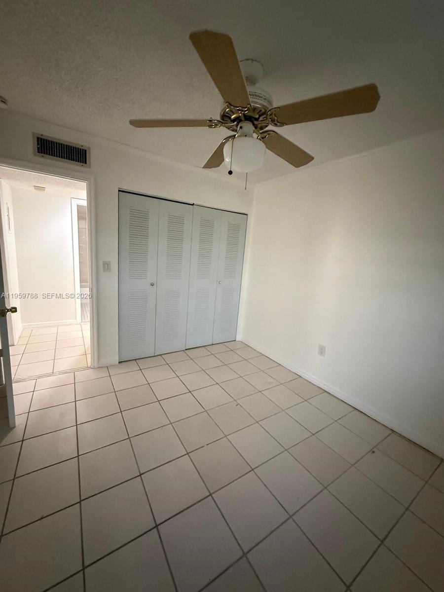 9520 Southwest 8th Street, Unit 111 Miami, FL 33174 - Photo 30 of 31 a view of an empty room and window