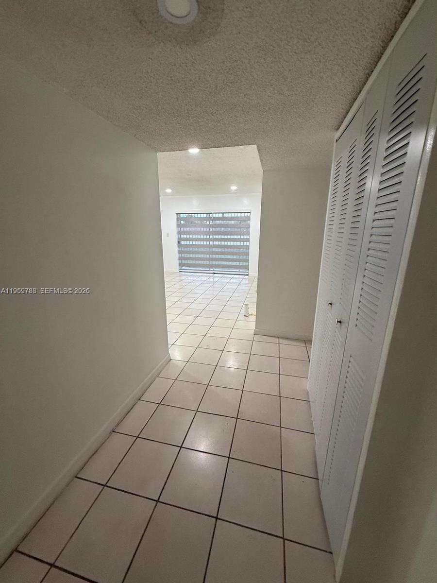9520 Southwest 8th Street, Unit 111 Miami, FL 33174 - Photo 3 of 31 a view of empty room