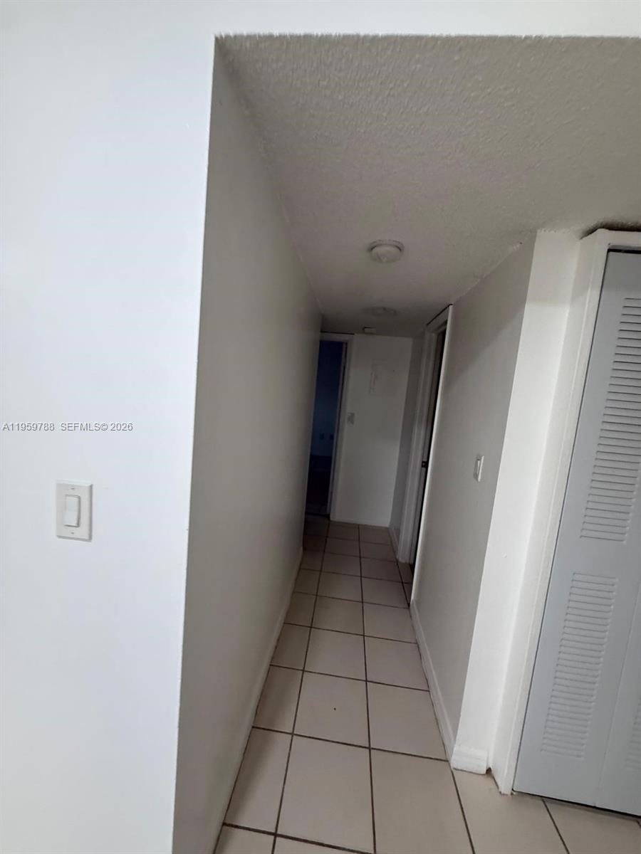 9520 Southwest 8th Street, Unit 111 Miami, FL 33174 - Photo 4 of 31 a view of an empty room