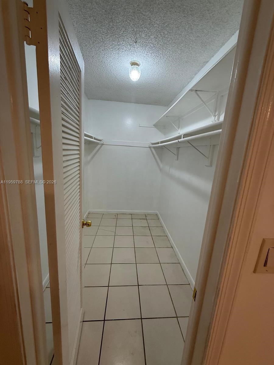 9520 Southwest 8th Street, Unit 111 Miami, FL 33174 - Photo 9 of 31 a view of empty room