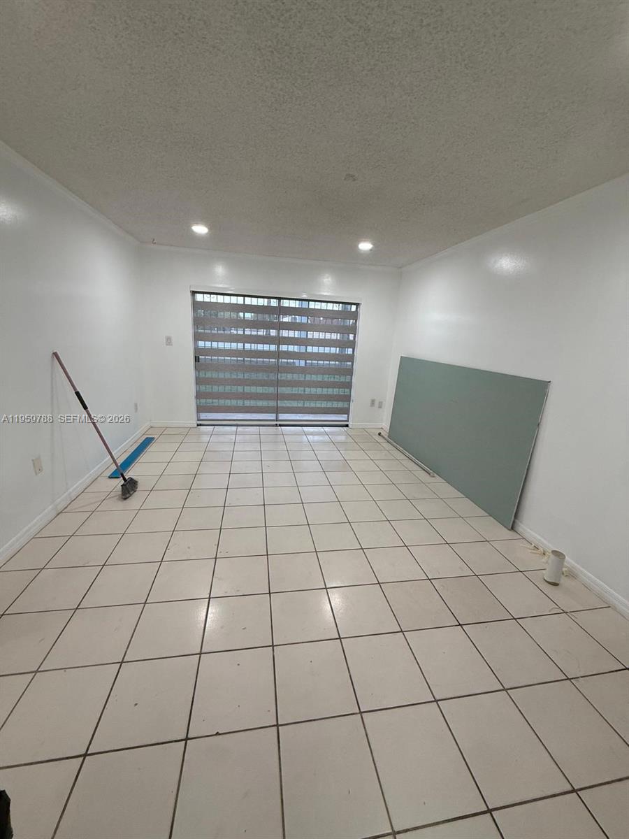 9520 Southwest 8th Street, Unit 111 Miami, FL 33174 - Photo 10 of 31 a view of an empty room