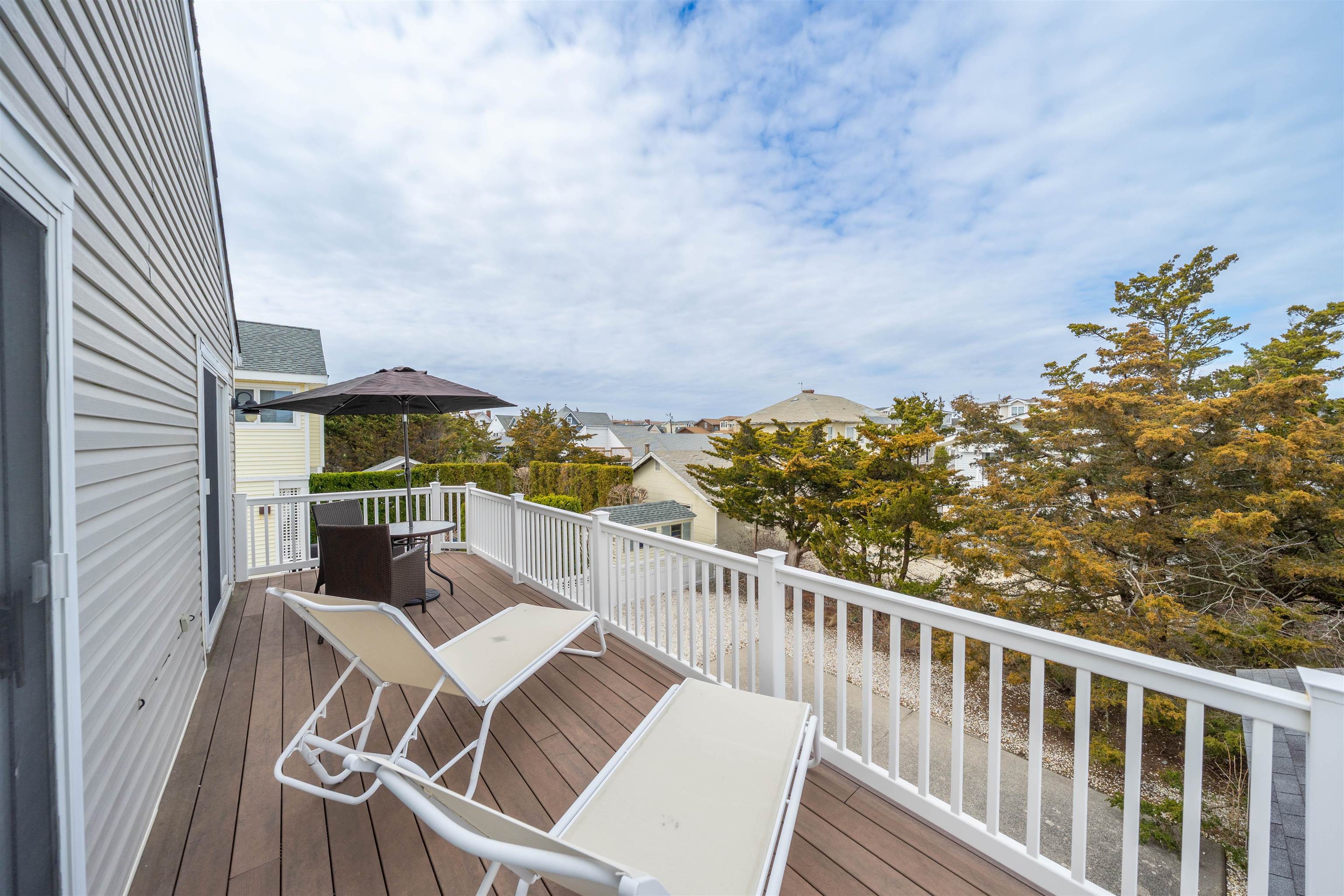 25 9th Street Avalon, NJ 08202 - Photo 15 of 32 a view of balcony with furniture