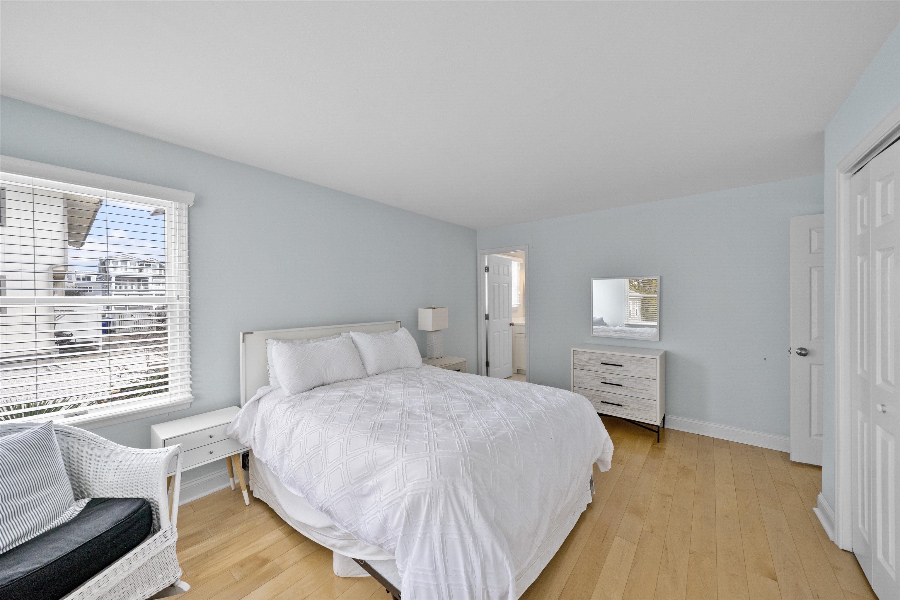 25 9th Street Avalon, NJ 08202 - Photo 16 of 32 a bed room with a bed and a window