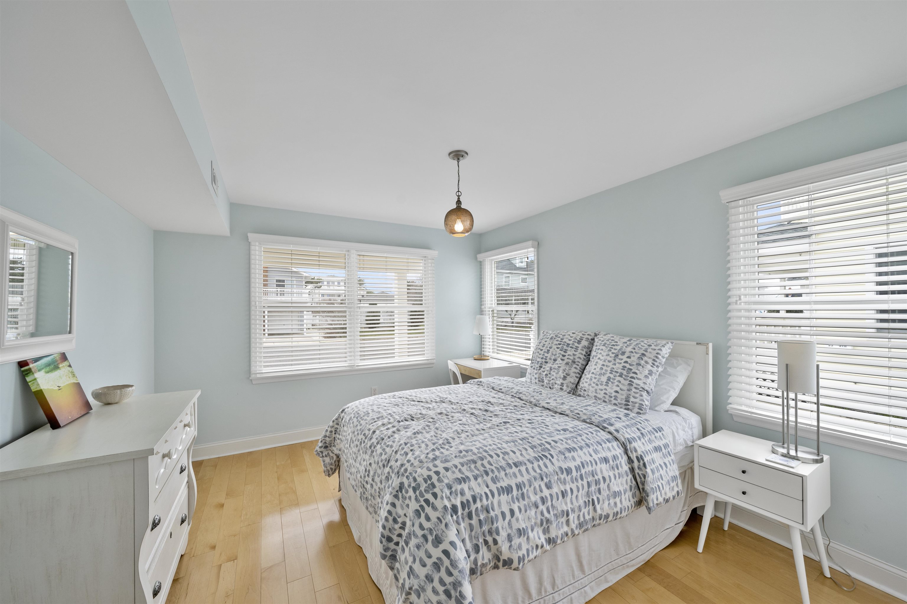 25 9th Street Avalon, NJ 08202 - Photo 20 of 32 a bedroom with a bed window and couch