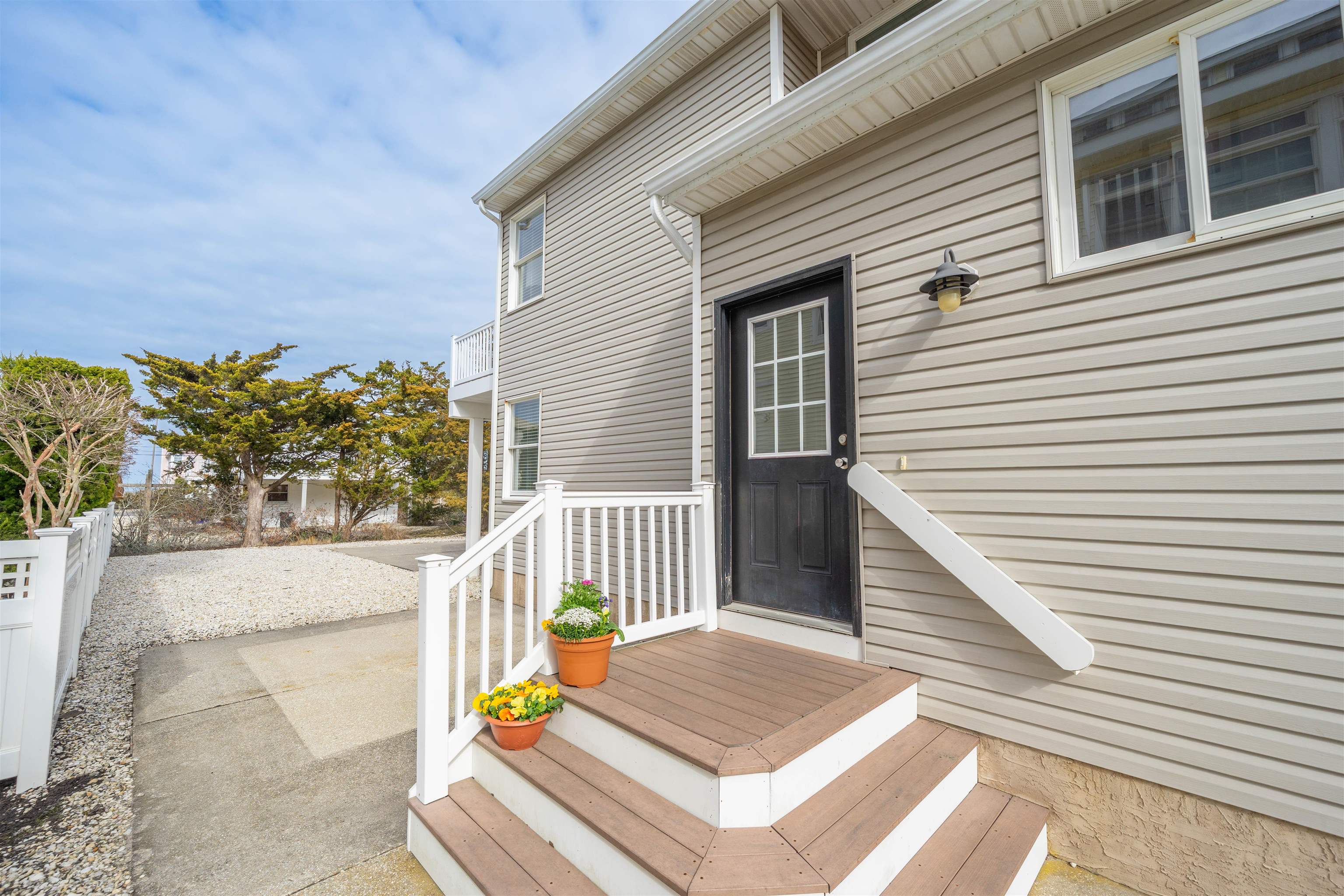 25 9th Street Avalon, NJ 08202 - Photo 2 of 32 a view of a entryway door front of house