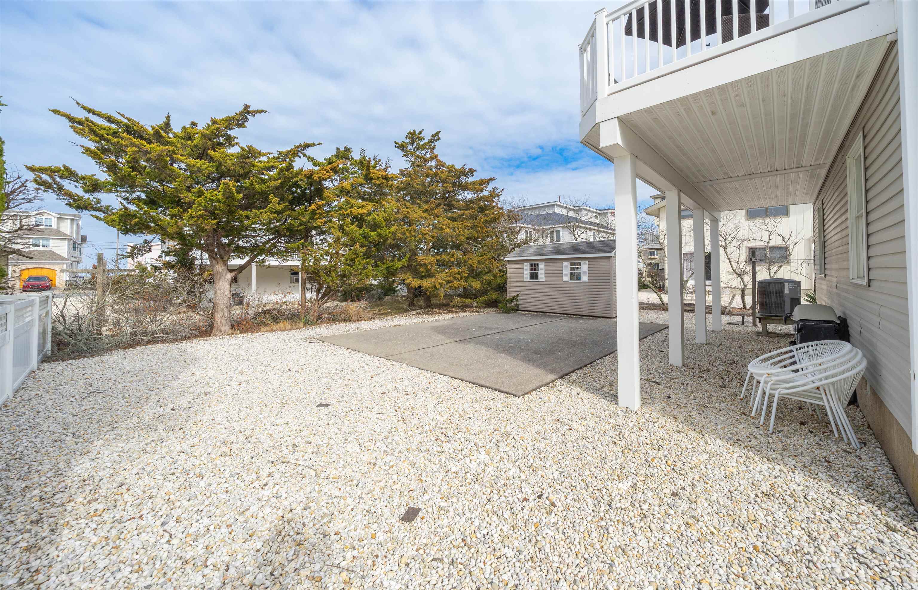 25 9th Street Avalon, NJ 08202 - Photo 22 of 32 a view of a chairs and table in the patio