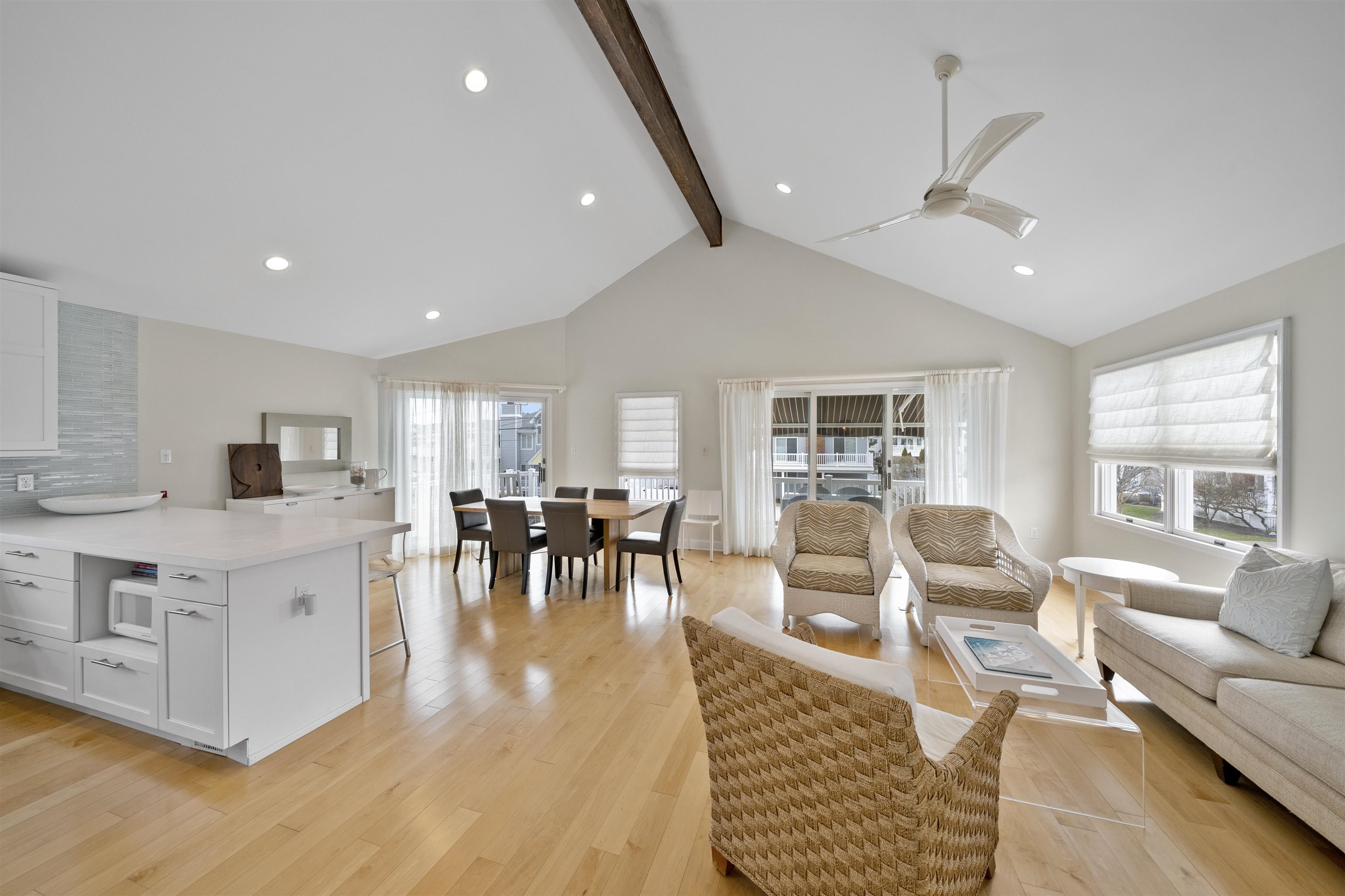 25 9th Street Avalon, NJ 08202 - Photo 4 of 32 a living room with fireplace furniture and a large window