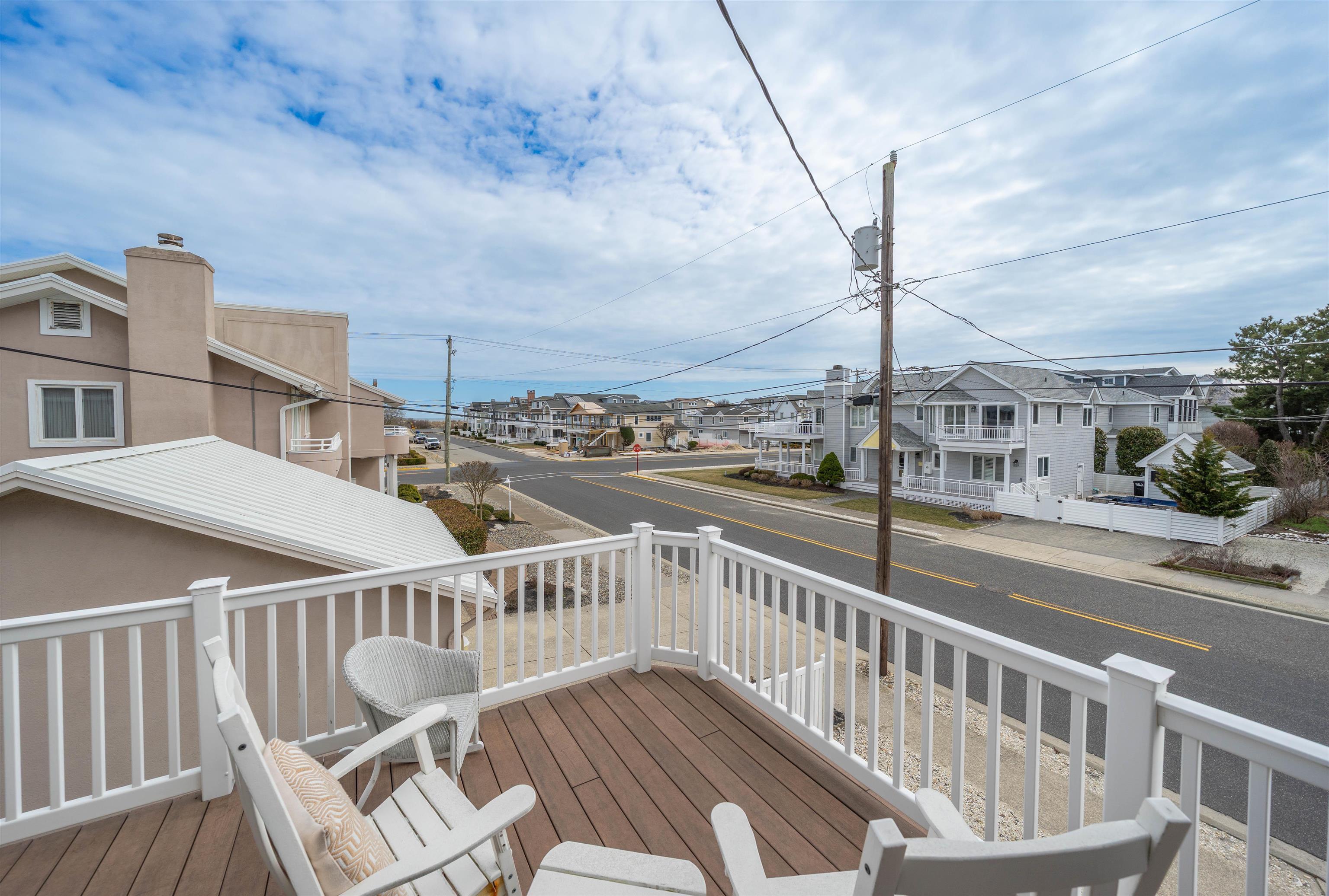 25 9th Street Avalon, NJ 08202 - Photo 6 of 32 a view of a balcony with car parked