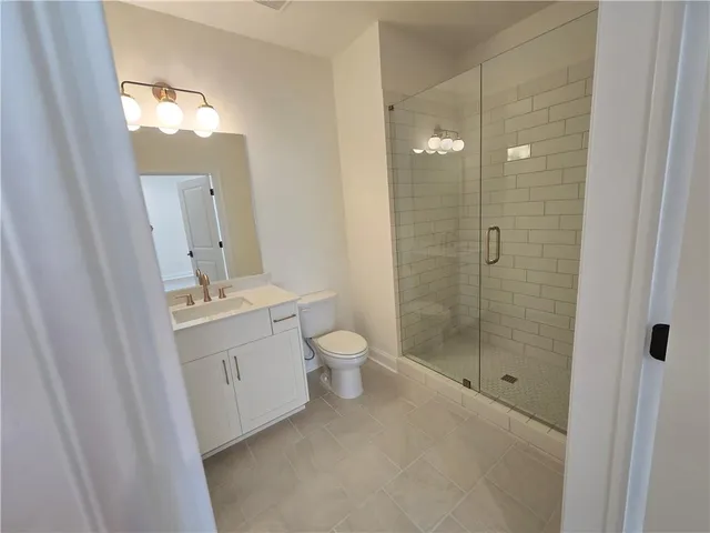 an empty room with wooden floor