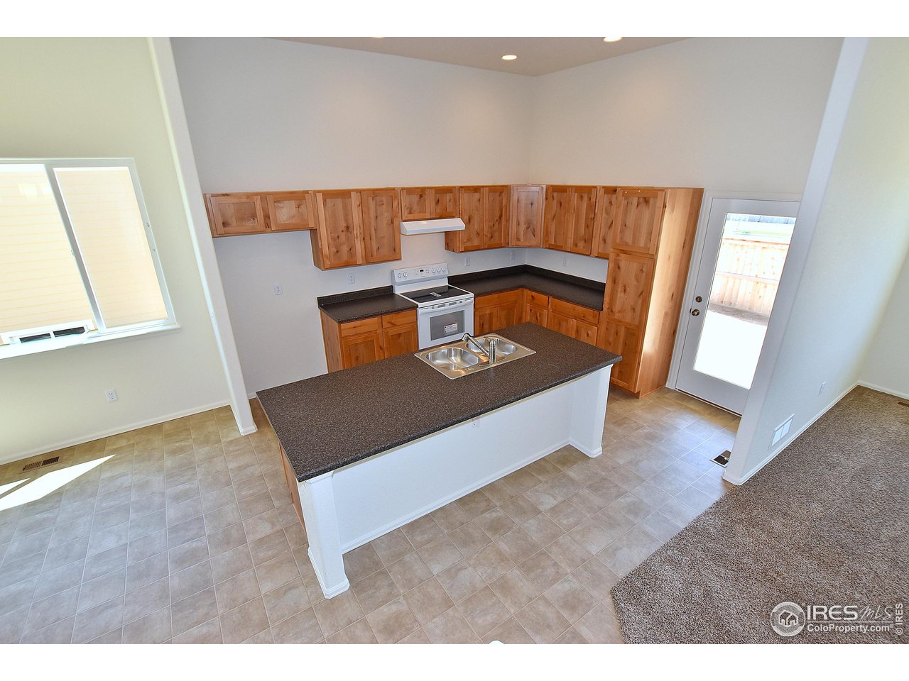 2324 Golden Way Windsor, CO 80550 - Photo 23 of 39 a view of living room with furniture and a window