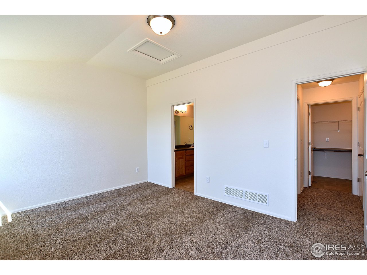 2324 Golden Way Windsor, CO 80550 - Photo 28 of 39 a view of an empty room and window