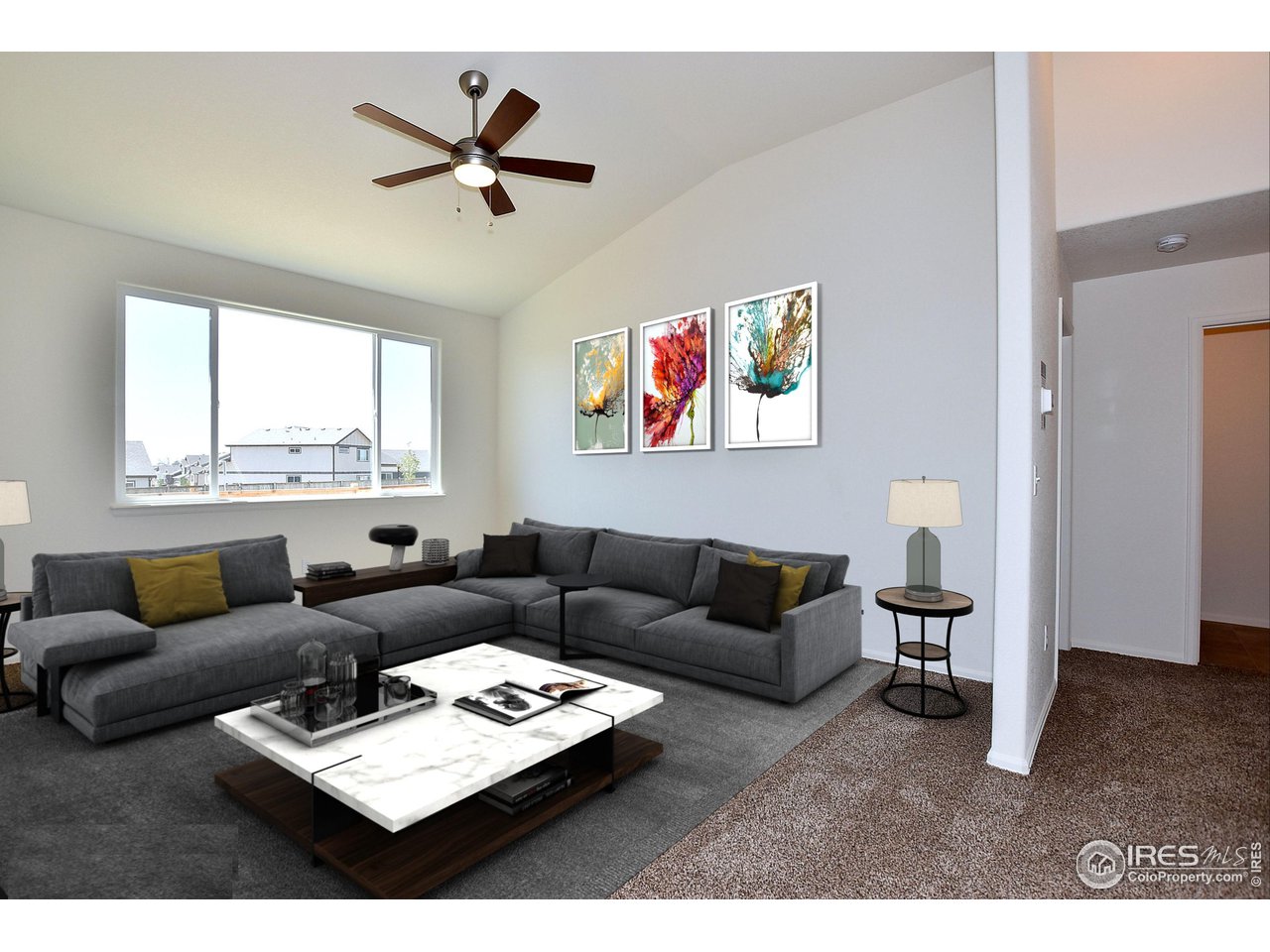2324 Golden Way Windsor, CO 80550 - Photo 5 of 39 a living room with furniture and a window