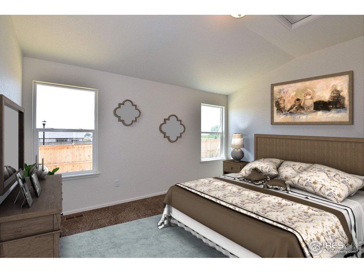 2324 Golden Way Windsor, CO 80550 - Photo 6 of 39 a bedroom with a bed and a flat screen tv