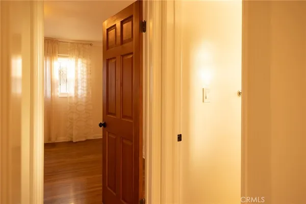 a view of bathroom with a shower and a door