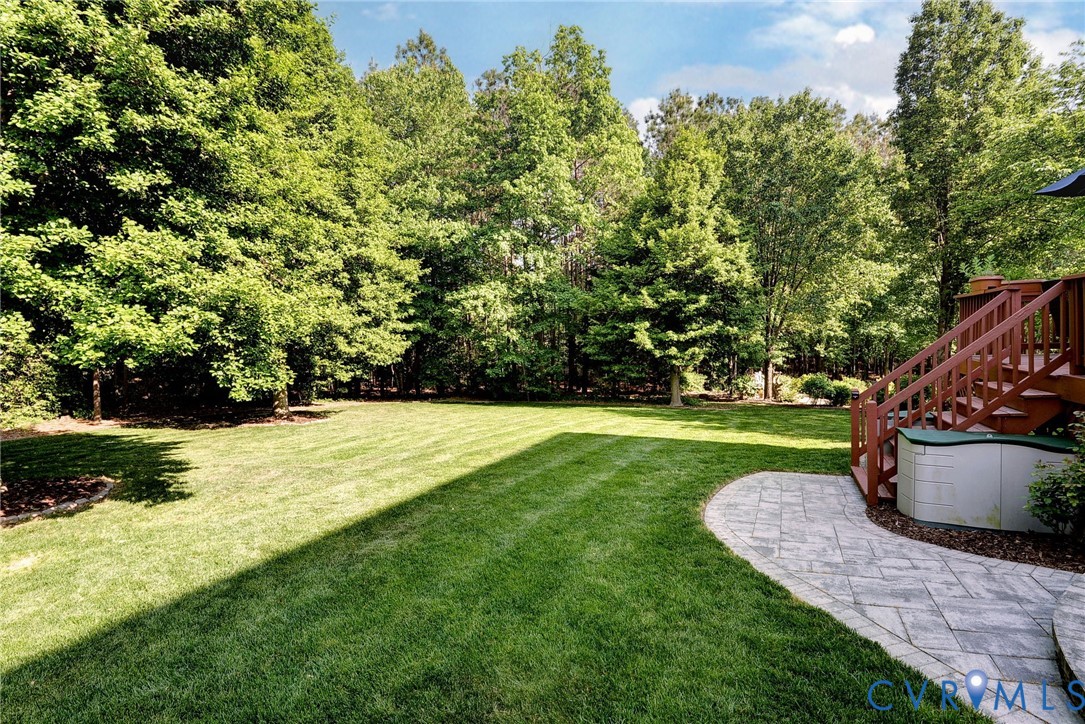 4015 Cold Spring Road Williamsburg, VA 23188 - Photo 46 of 57 Expansive lawn bordered by mature trees, featuring