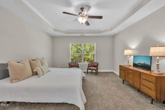 a kitchen with stainless steel appliances kitchen island granite countertop a refrigerator and a sink
