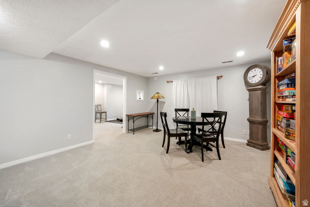 357 South 320 W Street Lindon, UT 84042 - Photo 22 of 41 Spacious room featuring light gray wall paint, light-colored carpeting, white baseboards, and recessed lighting