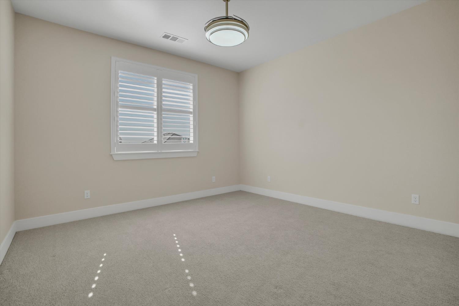 1898 Sanza Road Manteca, CA 95337 - Photo 25 of 41 an empty room with a window