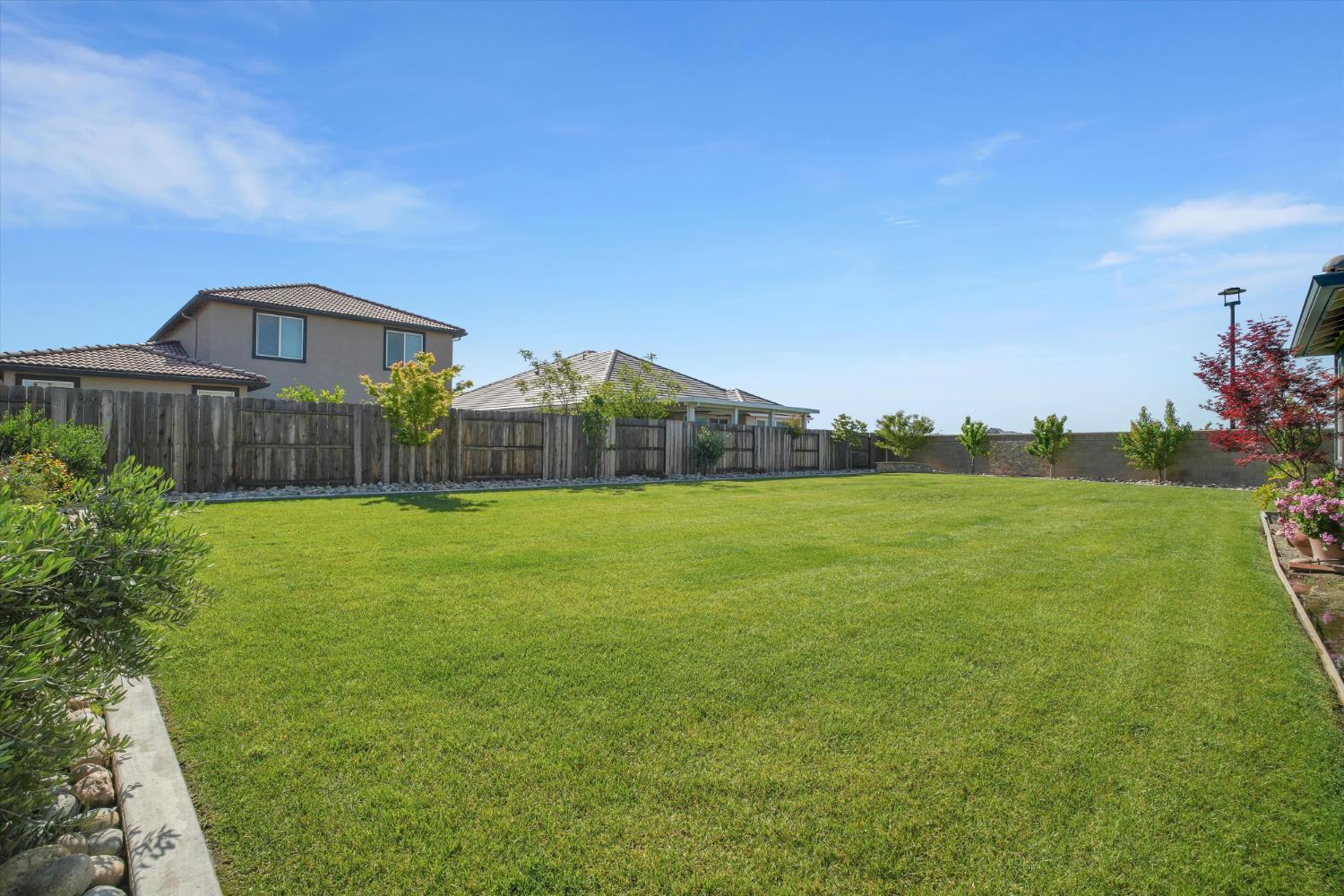 1898 Sanza Road Manteca, CA 95337 - Photo 28 of 41 a front view of a house with garden