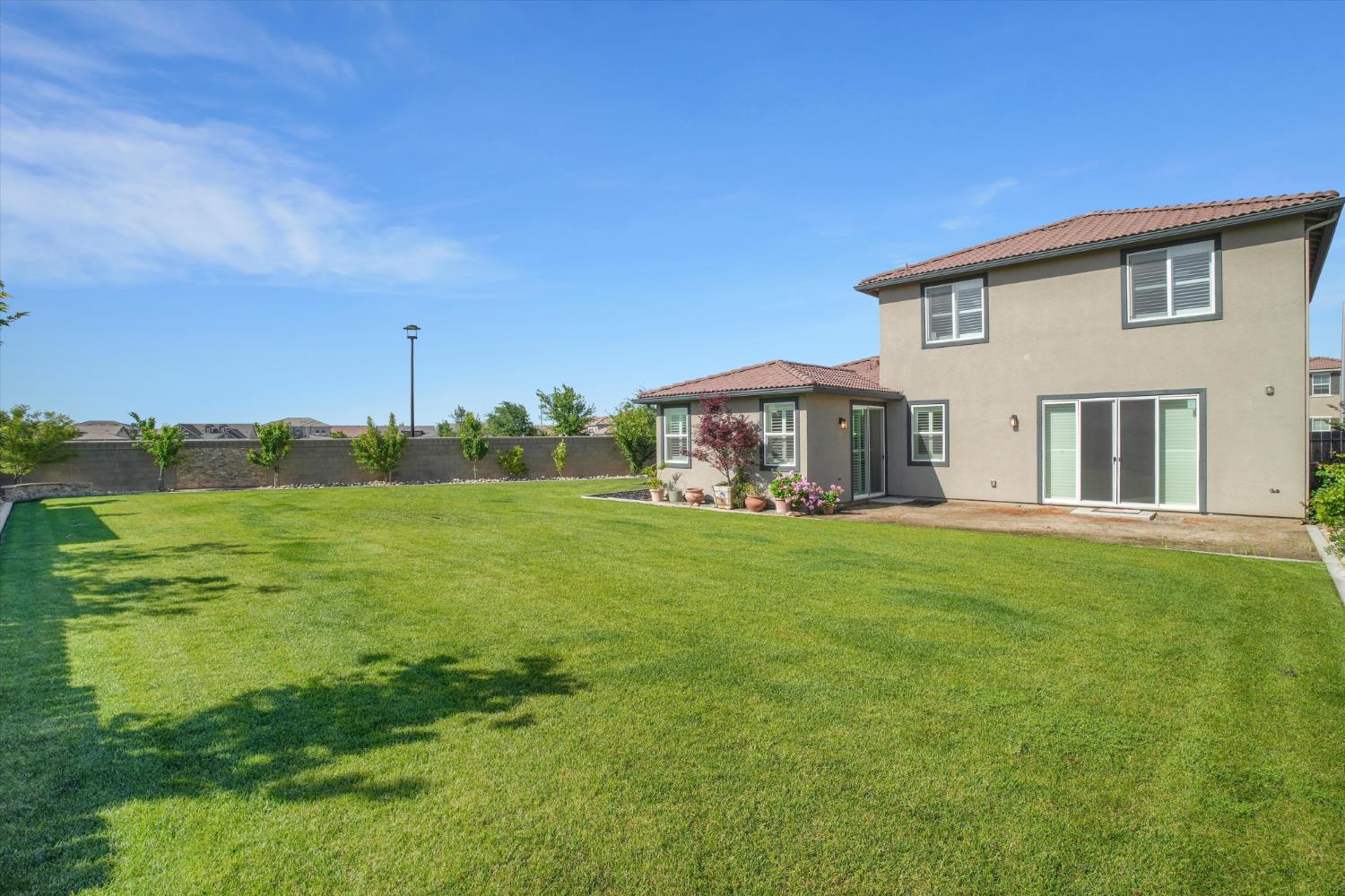 1898 Sanza Road Manteca, CA 95337 - Photo 29 of 41 a front view of house with yard and seating