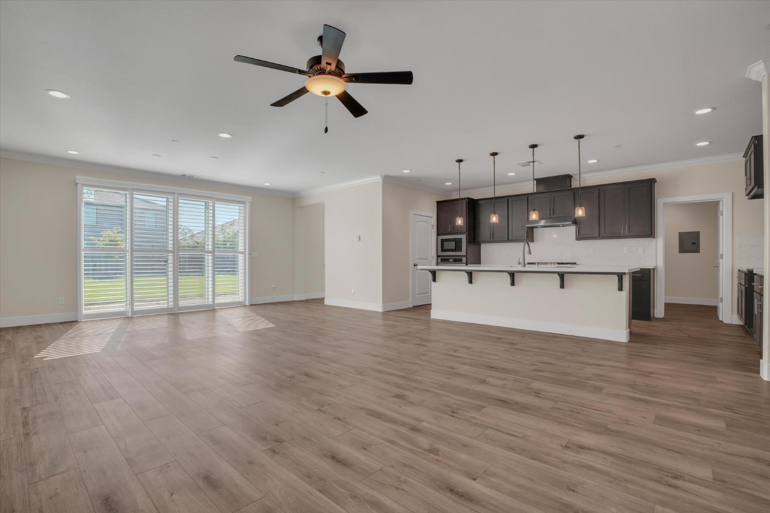 1898 Sanza Road Manteca, CA 95337 - Photo 9 of 41 a view of a kitchen with a sink dishwasher and a refrigerator
