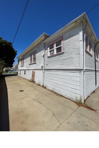 a black and white photo of a house
