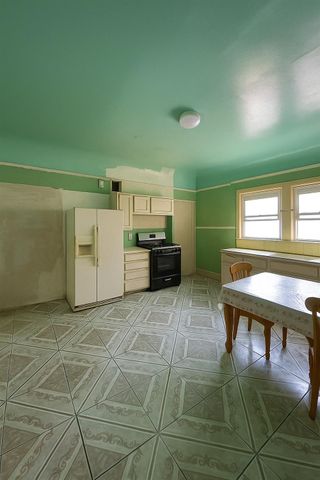 a room with furniture and a window