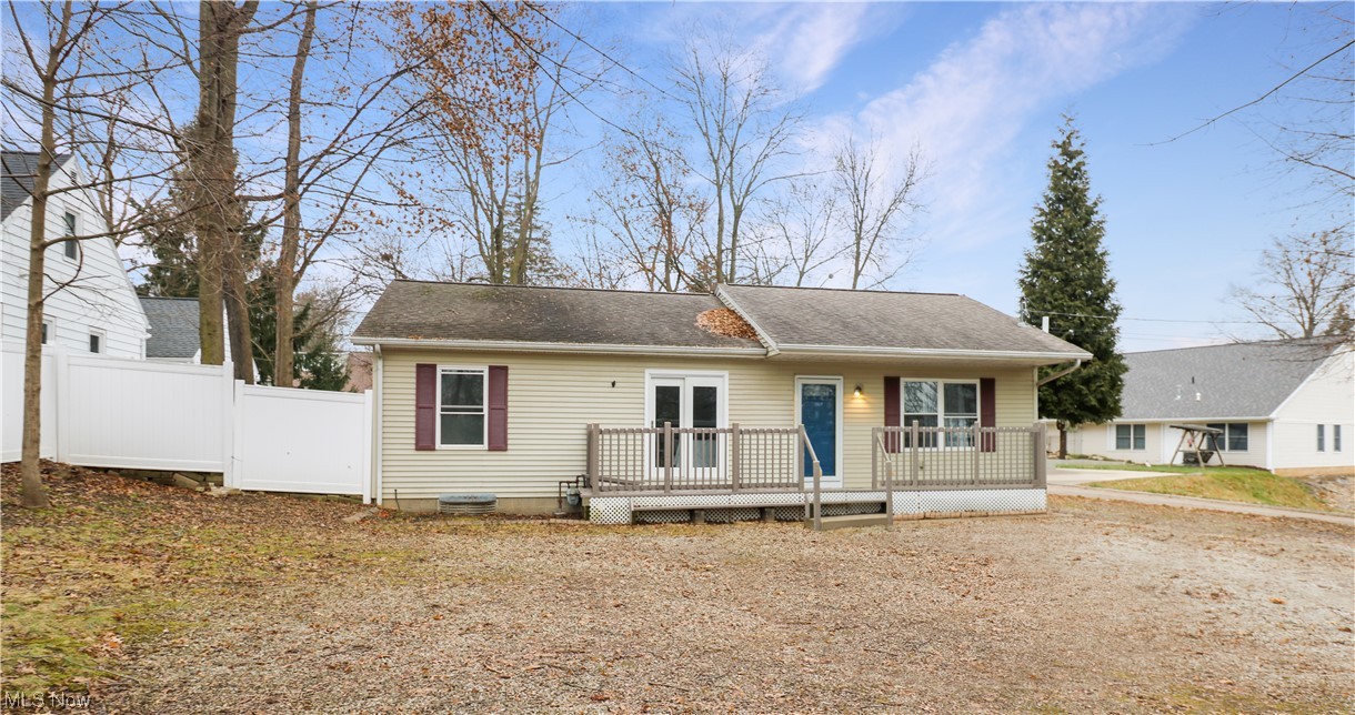 View of front of house with a deck