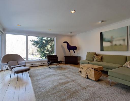 115 Lockwood Road Riverside, CT 06878 - Photo 2 of 10 a living room with furniture and a large window