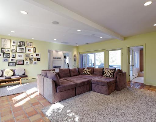 115 Lockwood Road Riverside, CT 06878 - Photo 6 of 10 a living room with furniture and a large window
