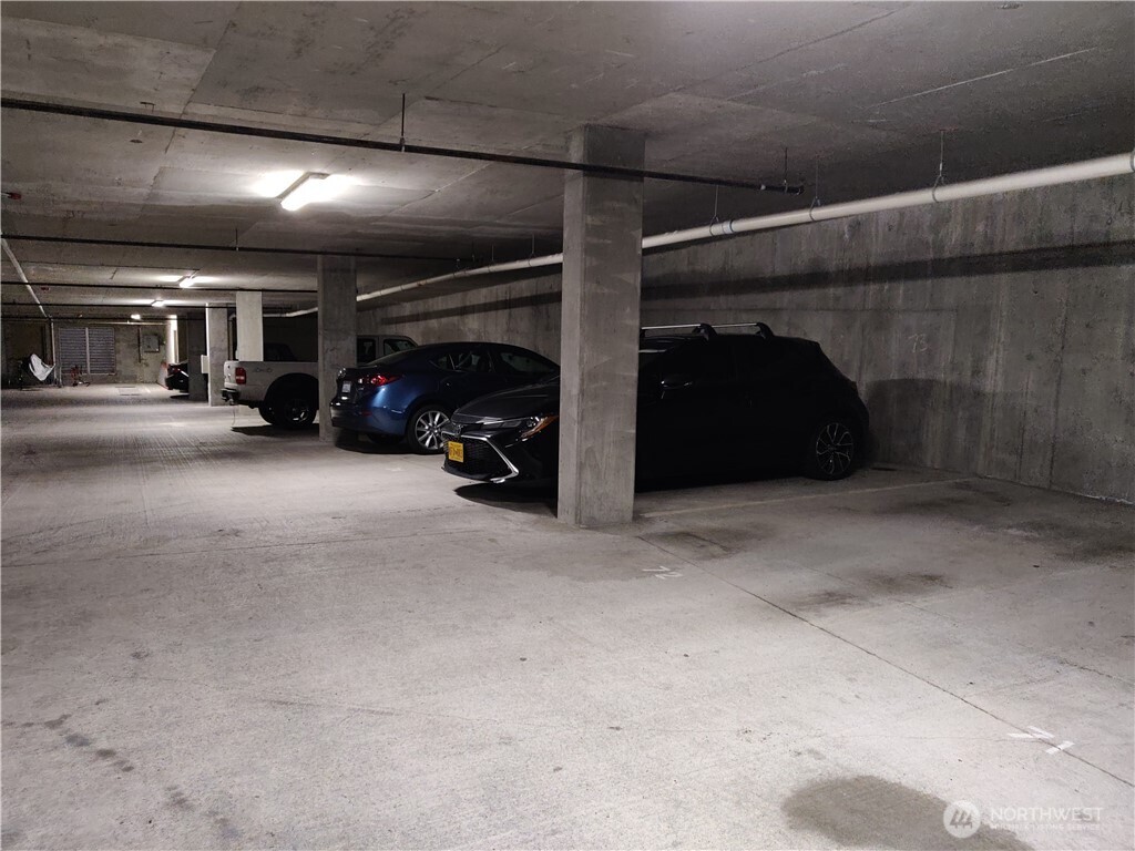 4547 8th Avenue Northeast, Unit 408 Seattle, WA 98105 - Photo 21 of 27 a view of parking area