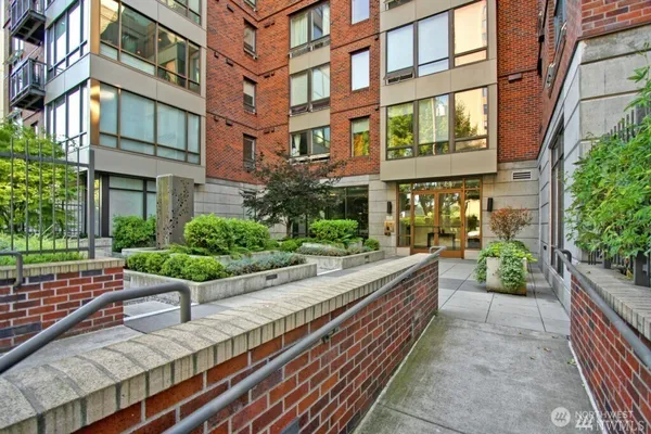 a view of a building with a bench