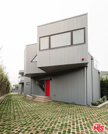a house with trees in front of it