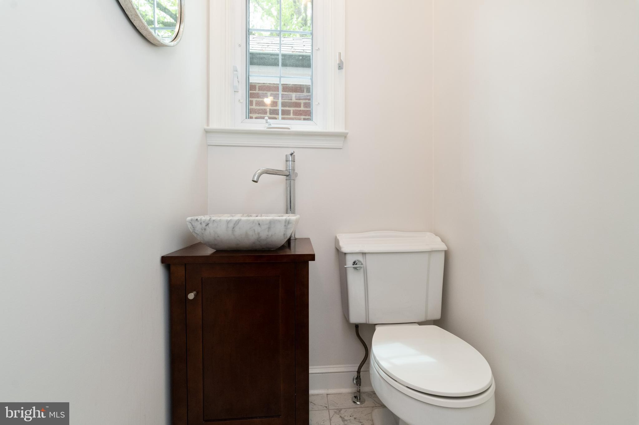 516 Wilton Road Towson, MD 21286 - Photo 16 of 43 Powder room on main level