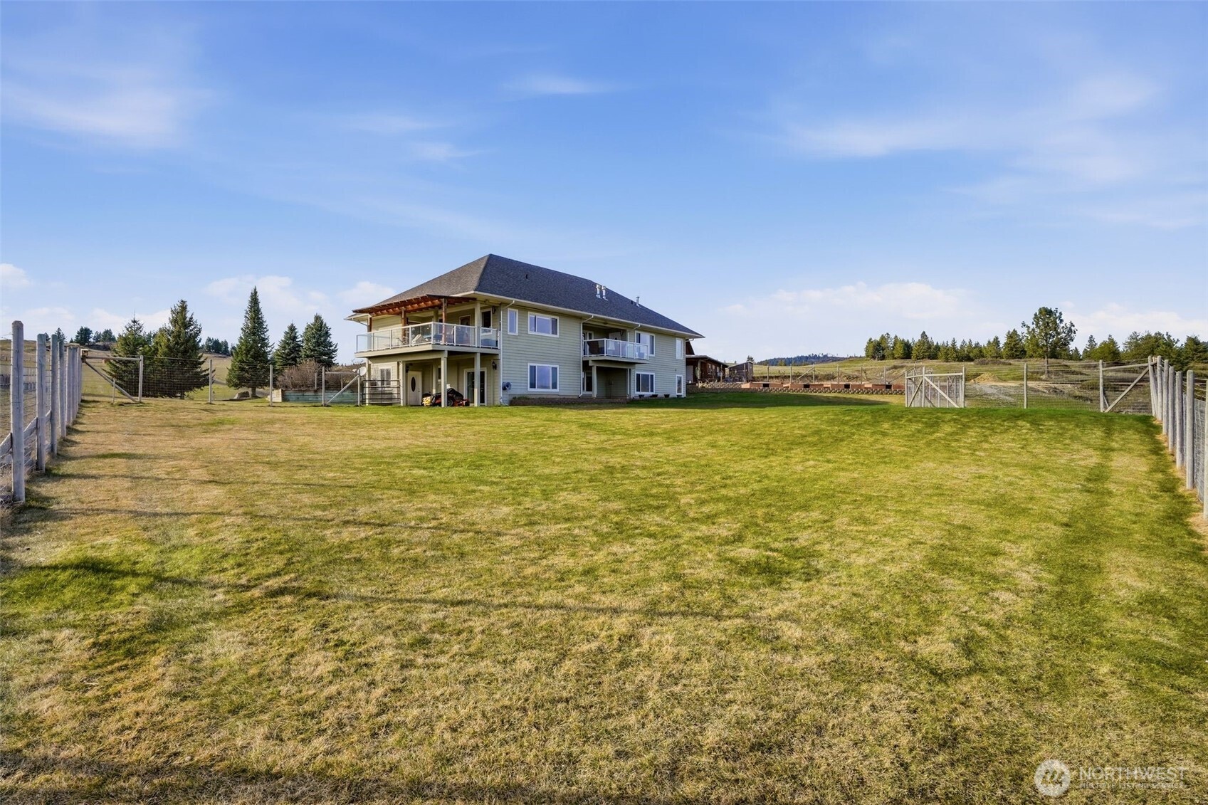 Undisclosed Address Elk, WA 99009 - Photo 12 of 40 a view of a swimming pool with an ocean view