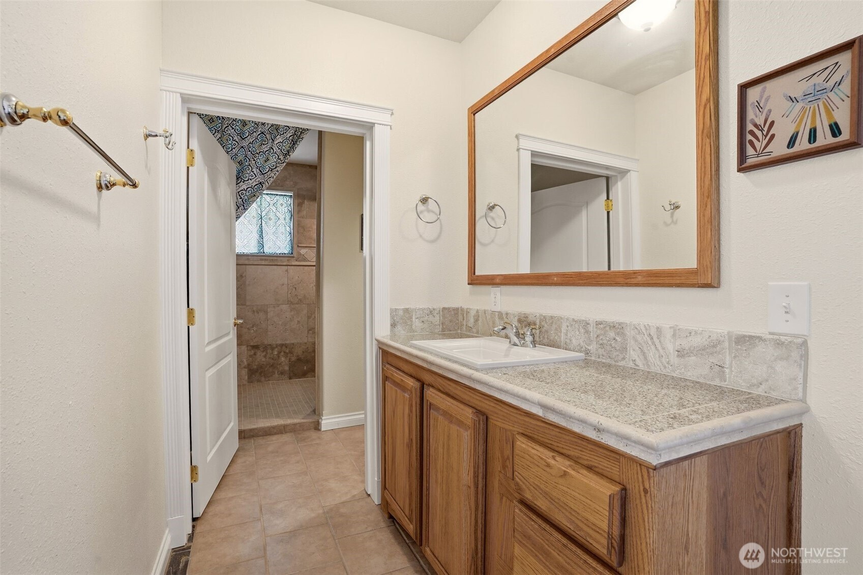 Undisclosed Address Elk, WA 99009 - Photo 25 of 40 a bathroom with a sink and a mirror