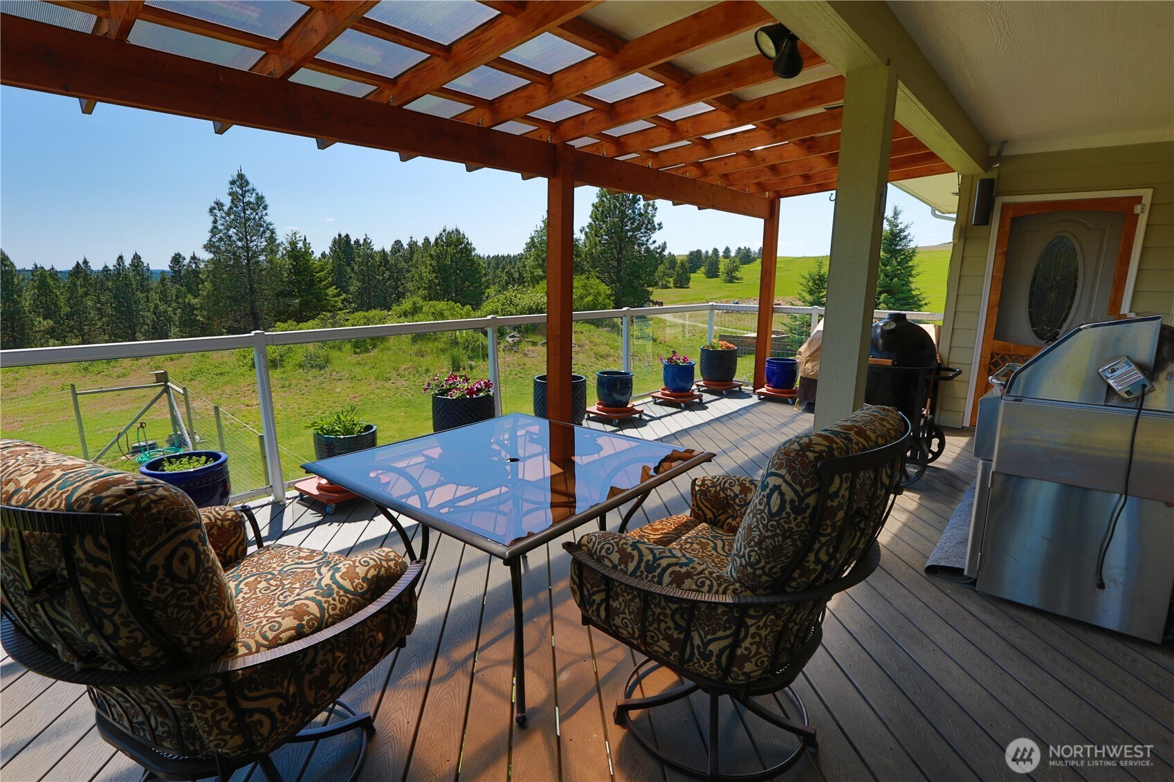 Undisclosed Address Elk, WA 99009 - Photo 10 of 40 a view of a balcony with furniture and pool table
