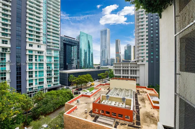 a view of swimming pool with a patio