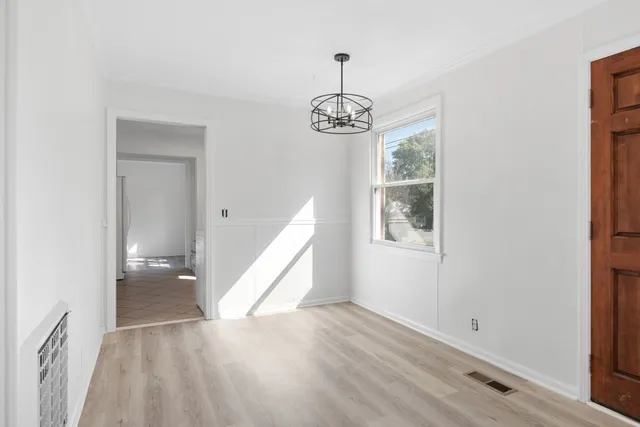 a view of livingroom with hardwood floor and ceiling fan