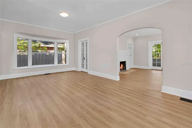 a kitchen with stainless steel appliances granite countertop a sink refrigerator and microwave