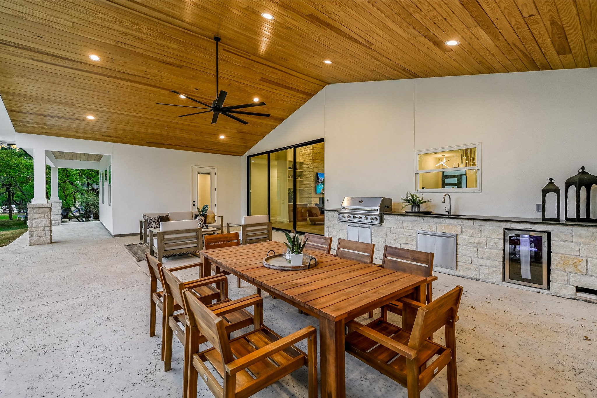 410 Shady Tree Drive Georgetown, TX 78633 - Photo 24 of 40 View of patio / terrace with an outdoor kitchen / dining area, a ceiling fan, and beverage cooler