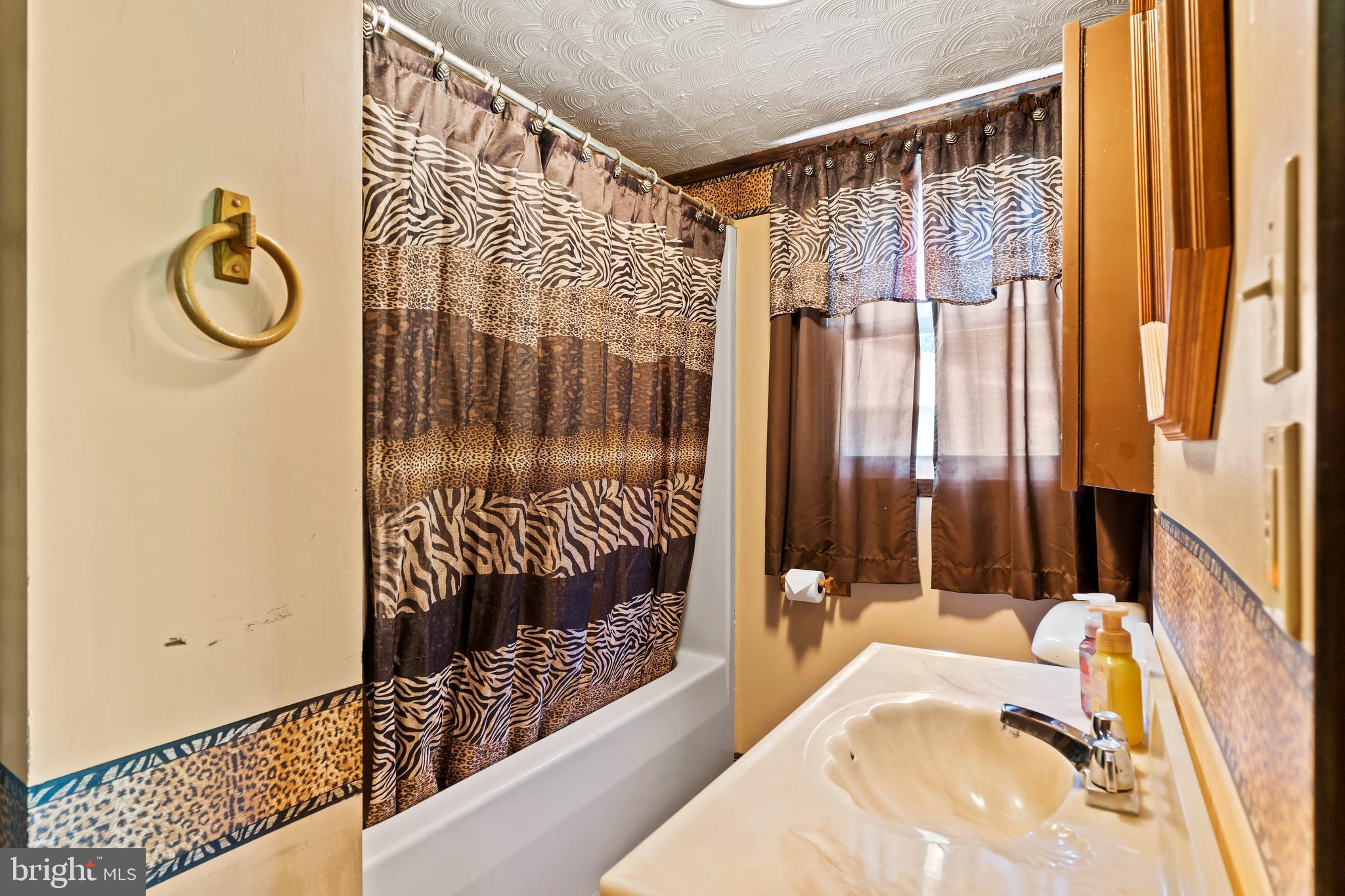 21429 Buck Trail Shade Gap, PA 17255 - Photo 14 of 42 a bathroom with a tub and a shower