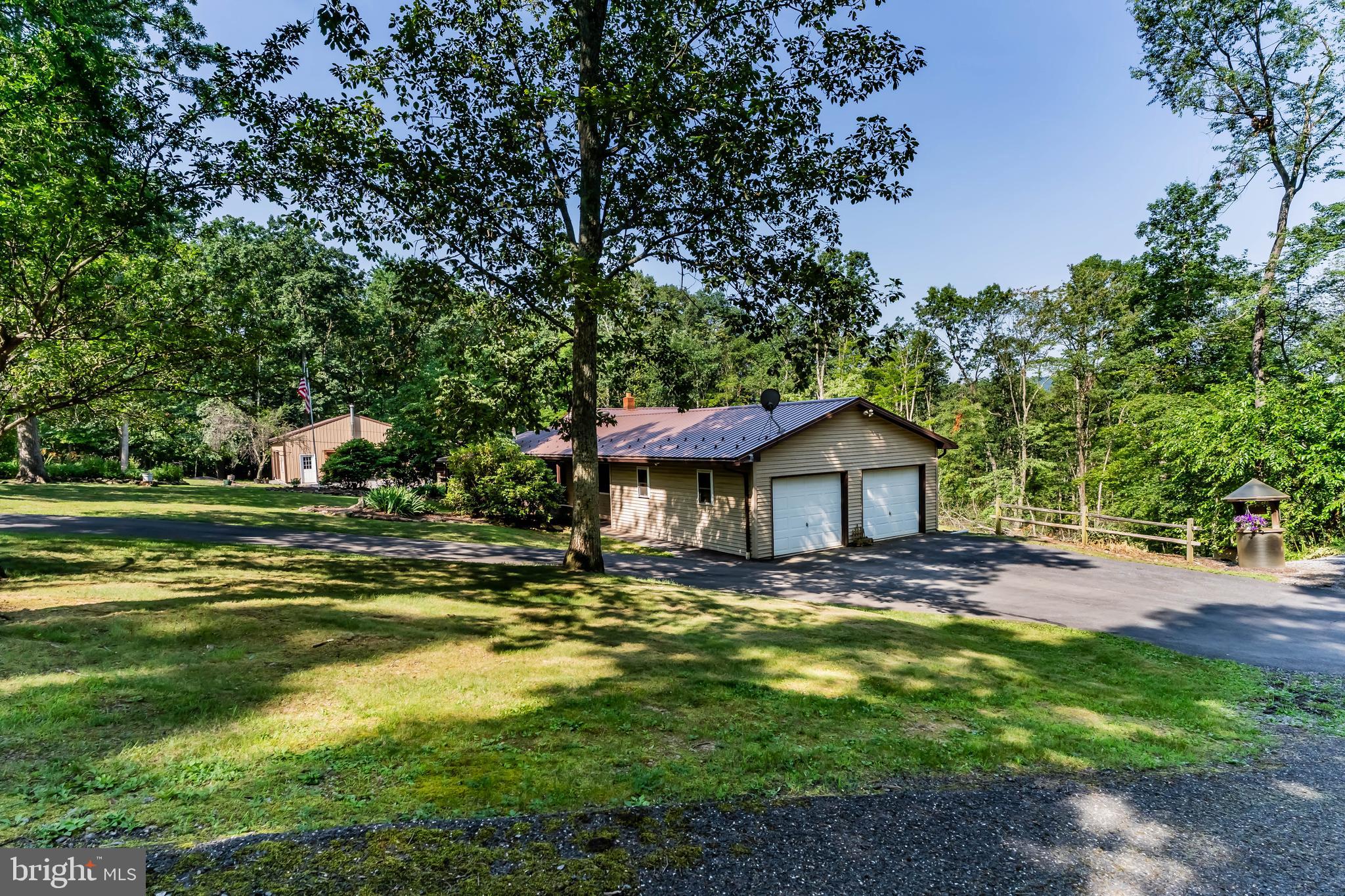 21429 Buck Trail Shade Gap, PA 17255 - Photo 25 of 42 a view of a house with a big yard plants and large trees