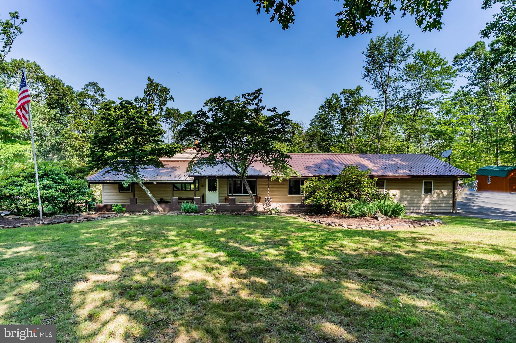 21429 Buck Trail Shade Gap, PA 17255 - Photo 38 of 42 a view of a house with a yard porch and sitting area