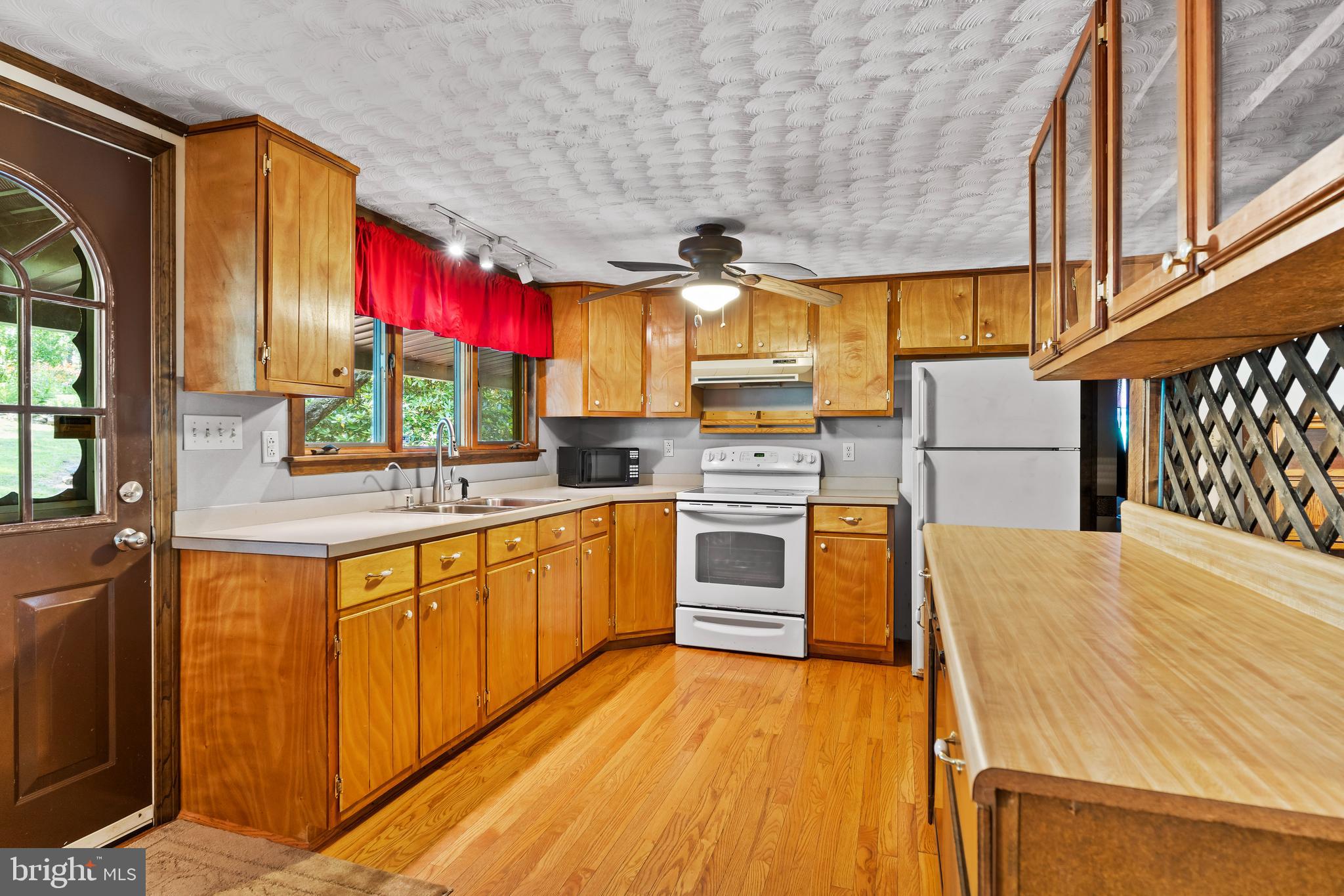 21429 Buck Trail Shade Gap, PA 17255 - Photo 9 of 42 a kitchen with stainless steel appliances granite countertop a sink and cabinets