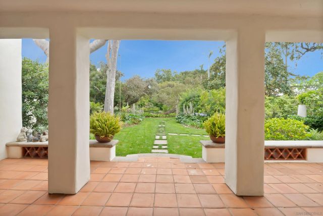 a view of a swimming pool with lounge chair