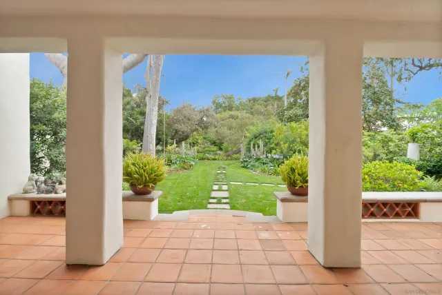 a view of a swimming pool with lounge chair