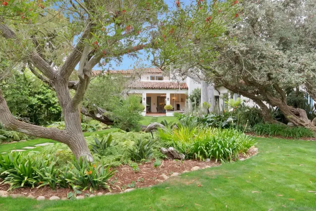a view of a table and chairs in the patio