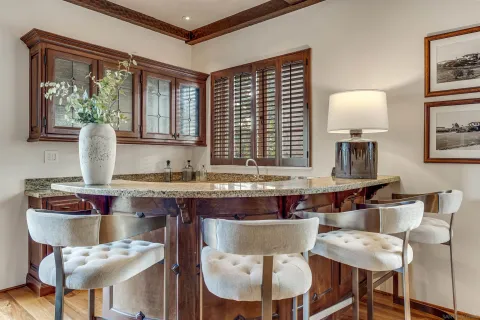 a spacious bathroom with a tub sink shower and mirror